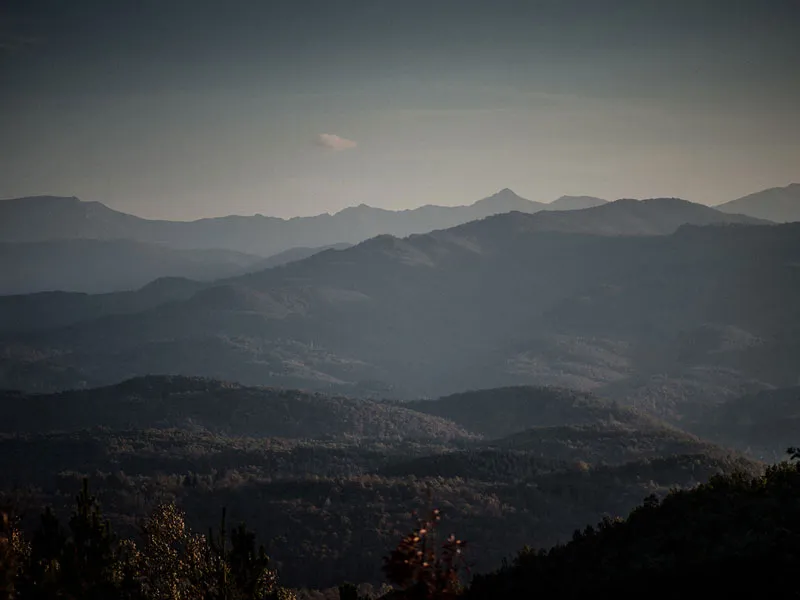 Misty mountain ridges at dusk