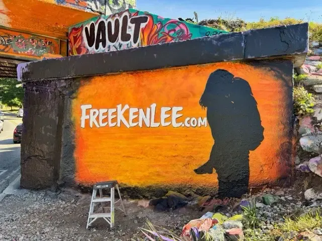 The FreeKenlee.com mural on Pensacola's Graffiti Bridge